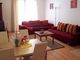 living room with the dining table in the 2-rooms flat
